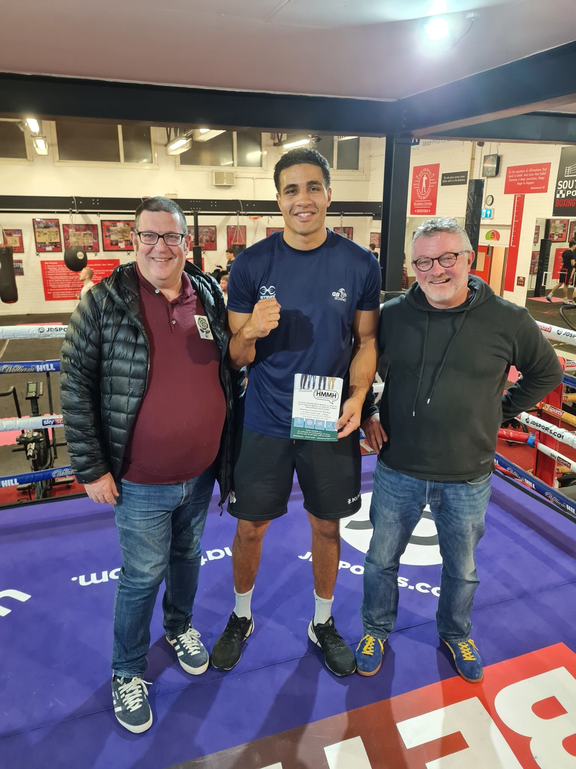 Boxer Delicious Orie with HMMH founders Paul and Euan